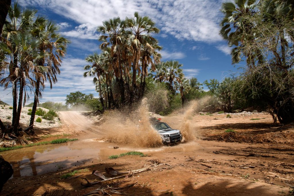 Land Rover Defender tested by Hagerty crossing a river