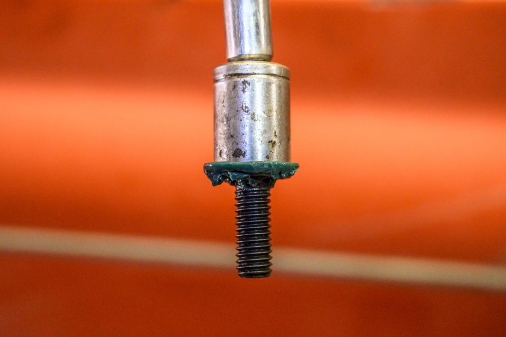 Grease a bolt head so it doesn't drop from a socket_Hagerty maintenance tips