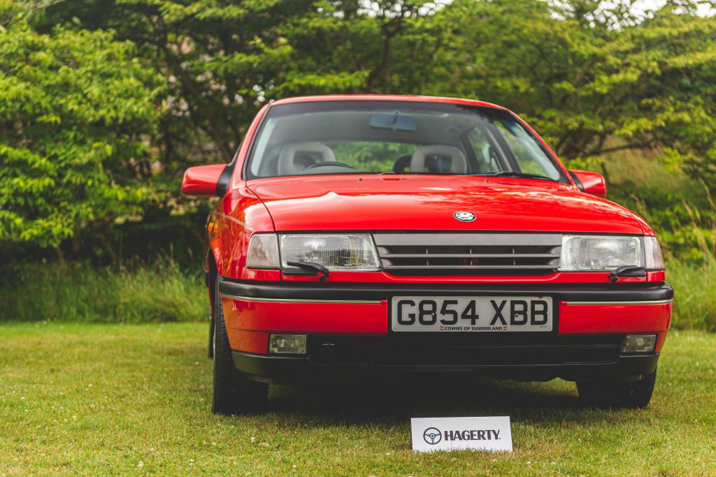 A Vauxhall Cavalier in Ferrari red at the Festival of the Unexceptional