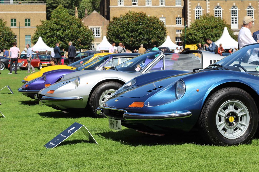 A feature display of vividly coloured Ferrari Dinos