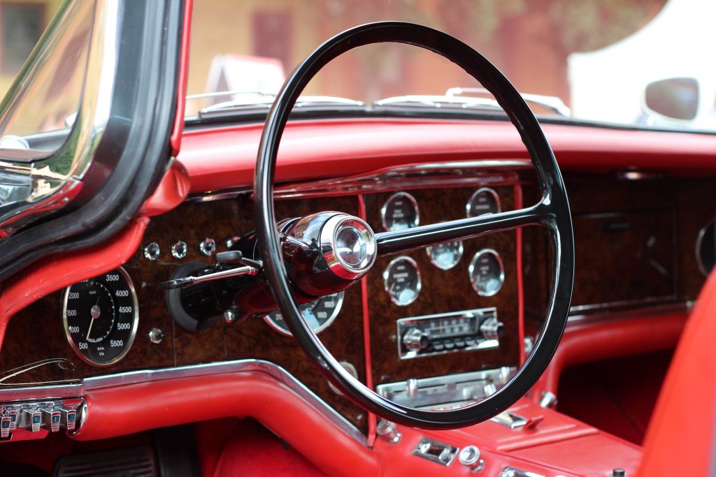 The interior of Tom Reah’s 1961 Facel Vega HK500; the dashboard is painted to replicate wood