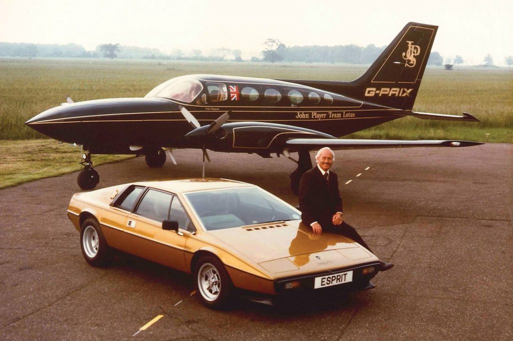 Colin Chapman with JPS plane and Lotus Esprit