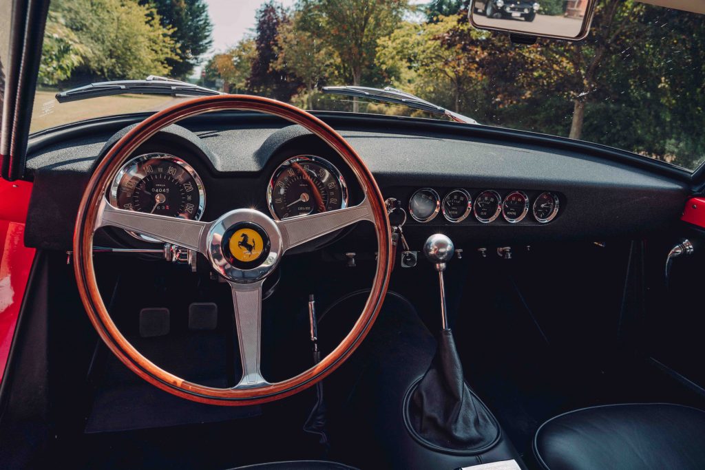 The dashboard of the Ferrari 250 GT SWB recreation is a work of art