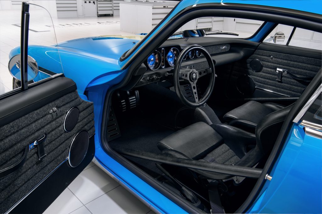 Momo seats and steering wheel in the Volvo P1800 Cyan restomod