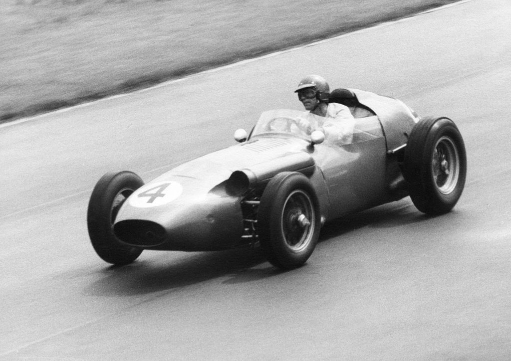 Carroll Shelby in the Aston Martin DBR4 at the British Grand Prix, 1959. Aston Martin