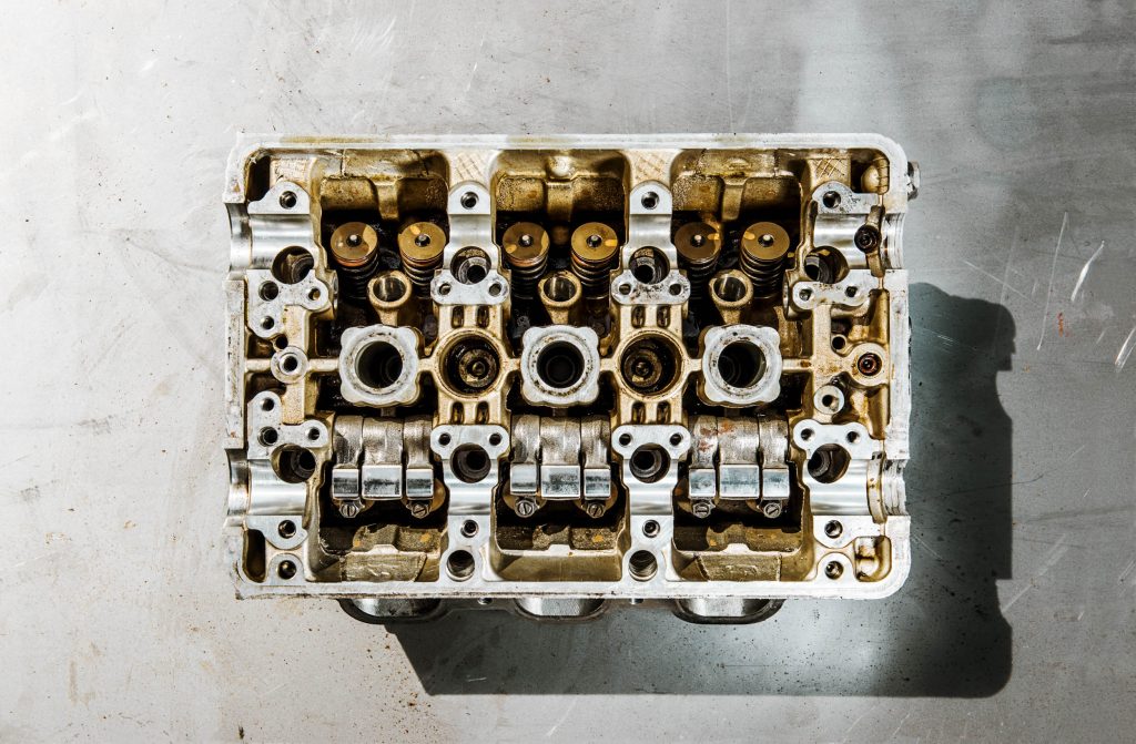 Removing the camshafts from this 1991 Acura NSX VTEC V-6 reveals the valves at the top and the three rocker arms per valve pair at the bottom. Photo: Josh Scott