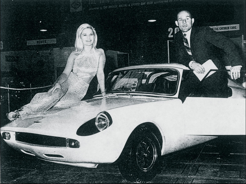 Stirling Moss with actress Monica Dietrich and a competition spec Unipower GT at the Racing Car Show January 1967