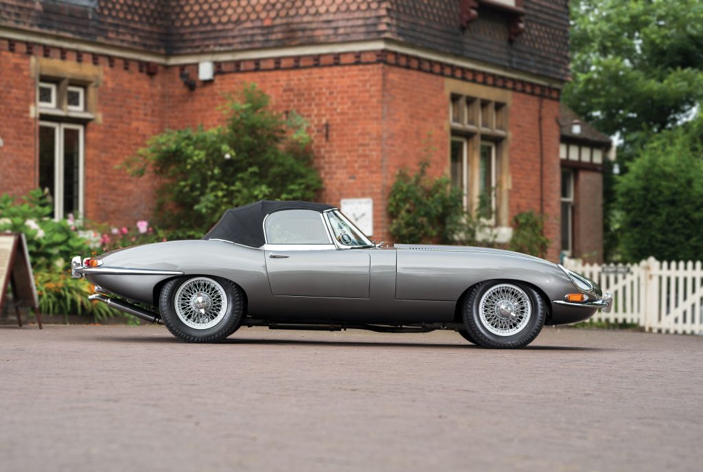 Jaguar E-Type Series 1 roadster with hood raised