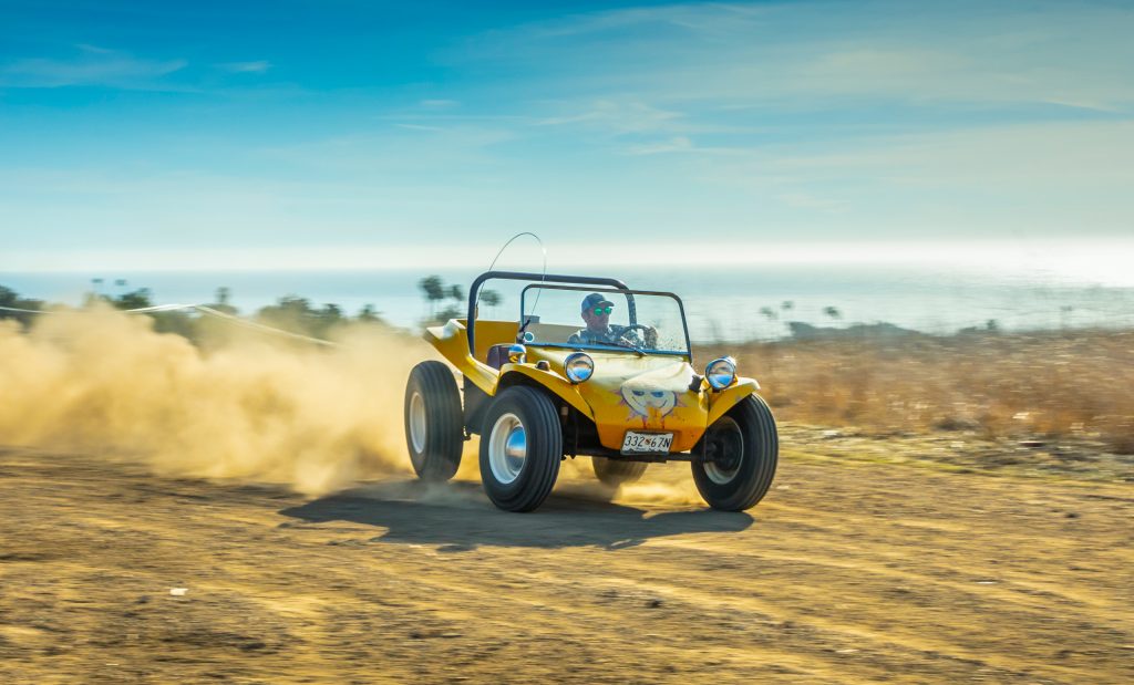 Fun on the beach in a Meyers Manx dune buggy