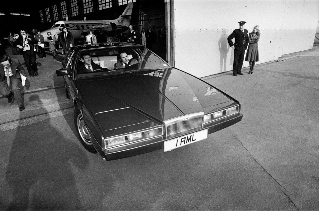 Prince Philip drives a prototype Aston Martin Lagonda. 17th February 1978.