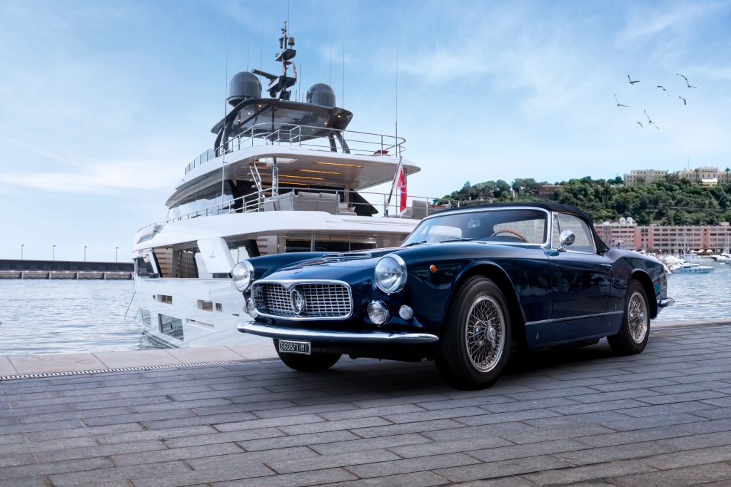 Monaco yacht and classic Ferrari