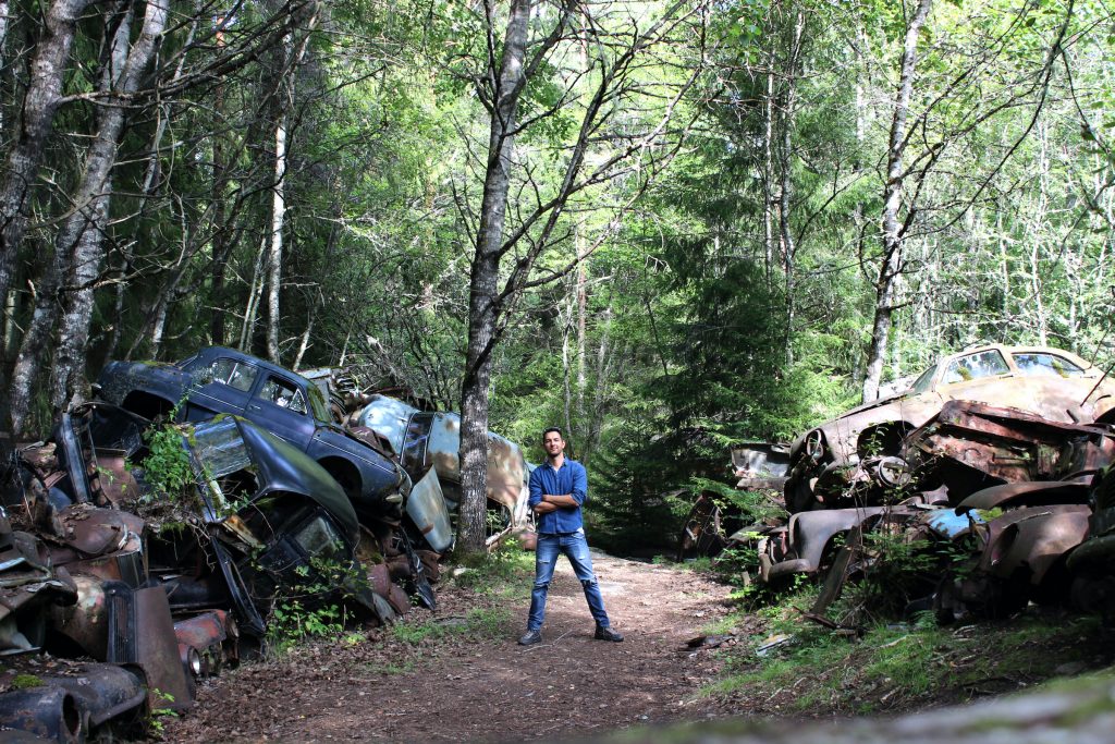 Philipp in a "car cemetery" in Sweden