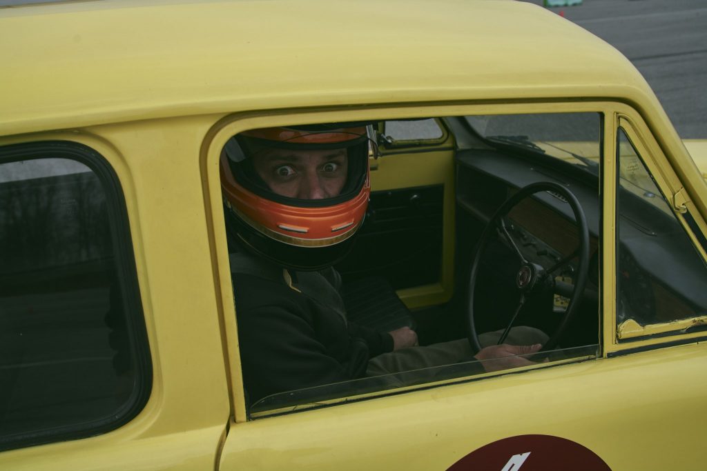 Sam Smith at the wheel of a Reliant Regal