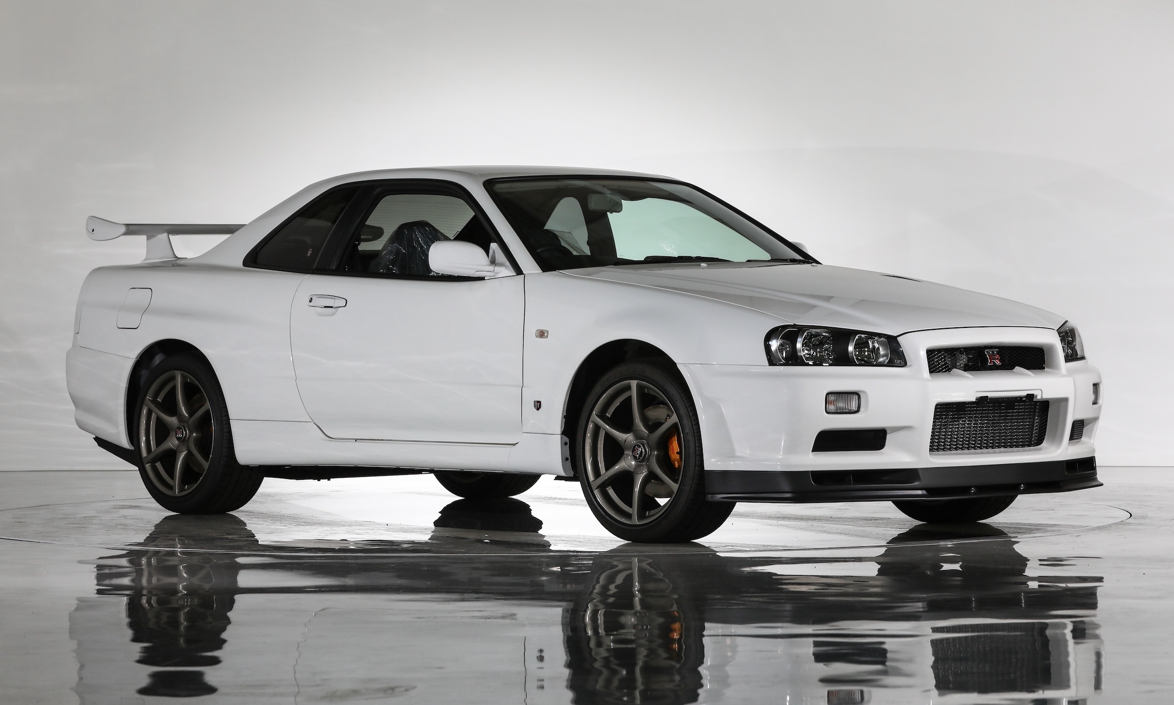 Six-mile Nissan Skyline GT-R R34 sells for a record £400,000