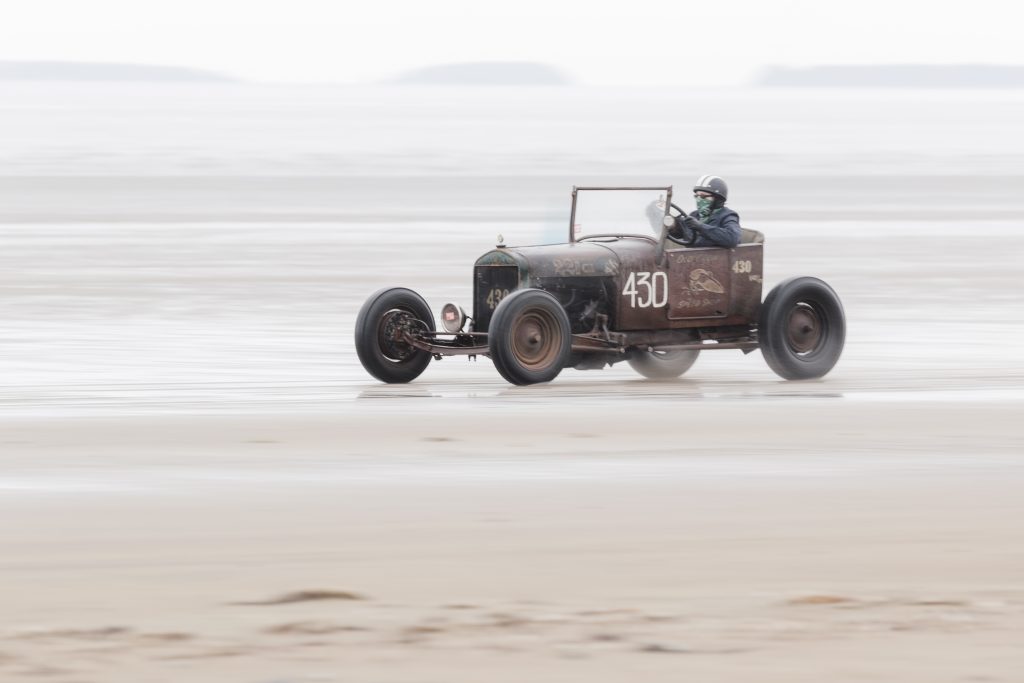 Joanna Kirkby driving her 1927 Model T at Pendine Sands