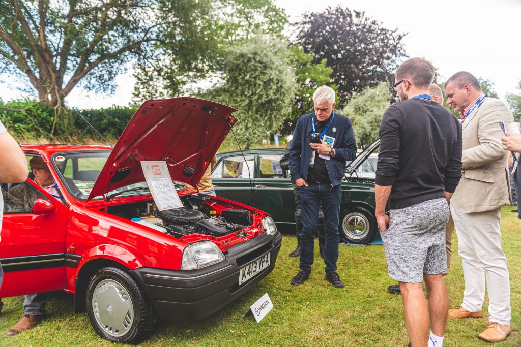 Jon Bentley judges a Rover 100 at the Hagerty Festival of the Unexceptional 2019