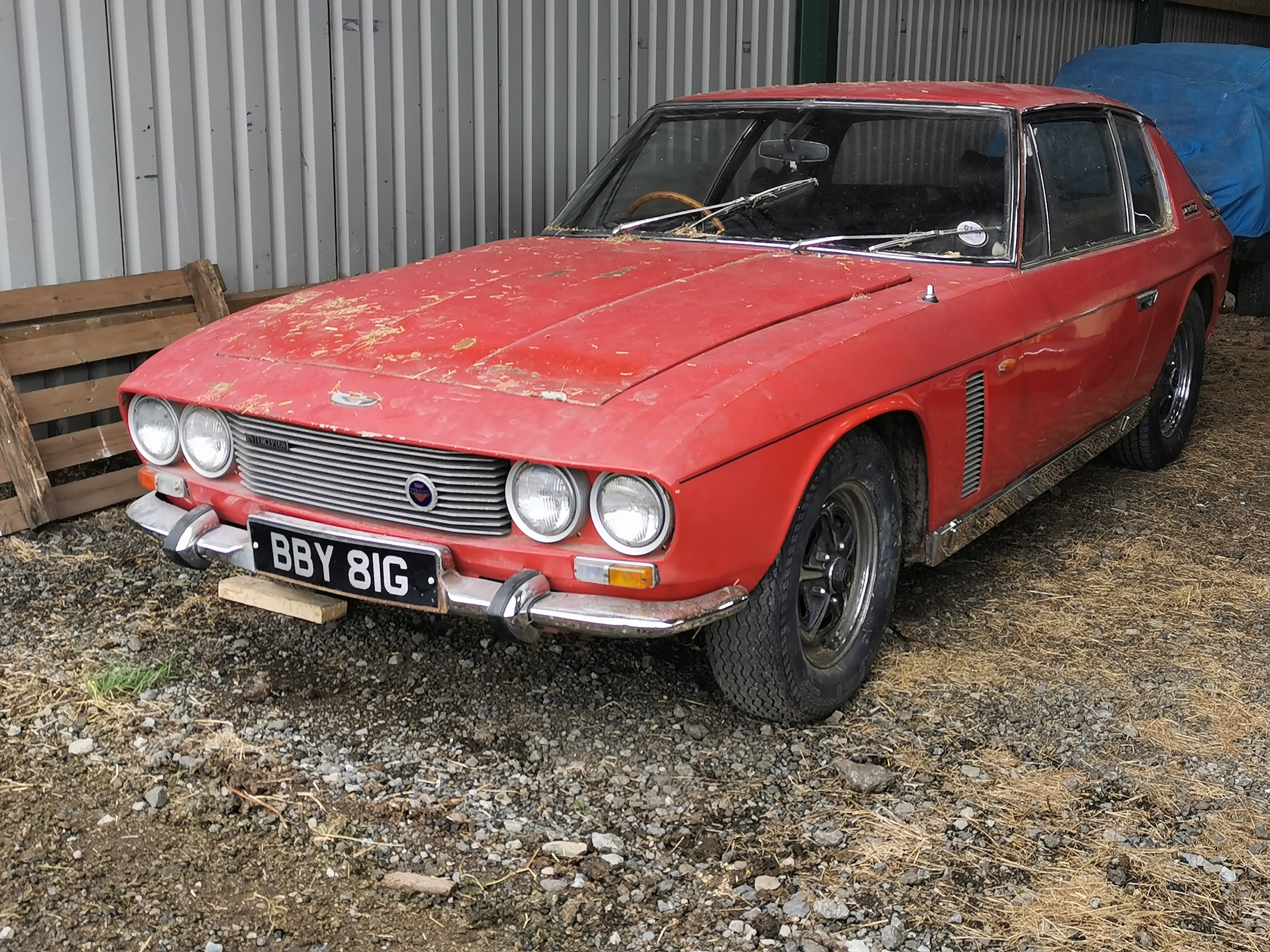 This cherry-red Jensen Interceptor is ripe for restoration