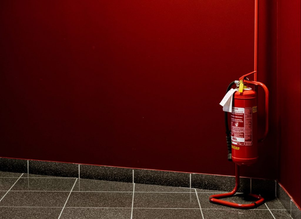 Fire extinguisher for garage when storing car