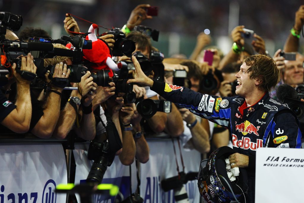 Sebastian Vettel of Germany and Red Bull Racing celebrates winning the Abu Dhabi Grand Prix 2010