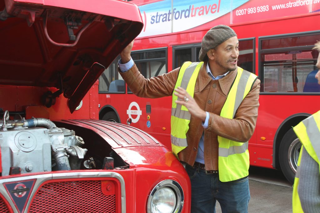 Fuzz Townshend with a double decker bus