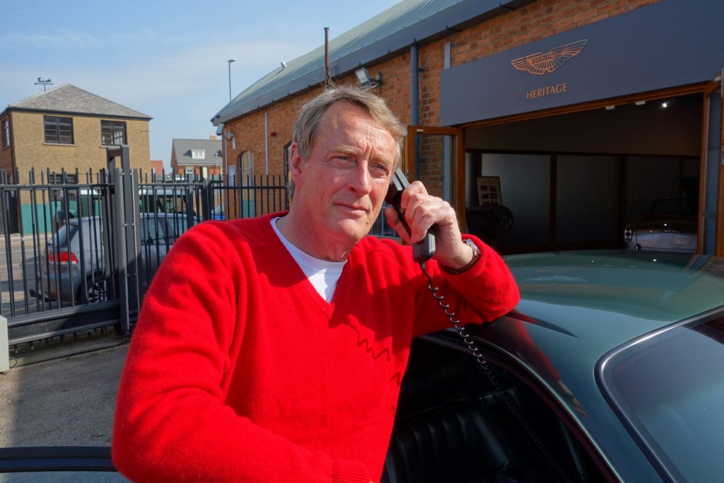 Andrew English on car phone