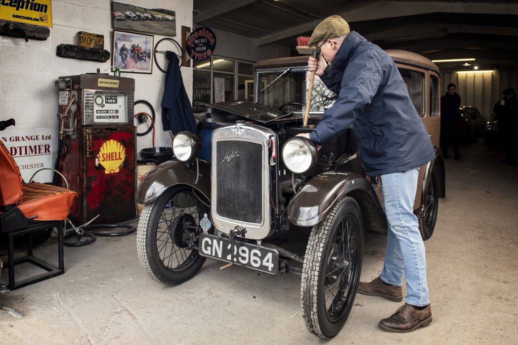 Simon Hucknall checks Austin Seven fuel level with a stick