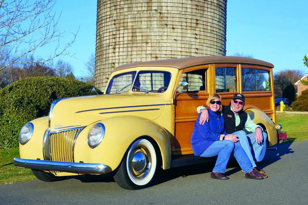 Tom Cotter and wife Pat with Ford woody wagon