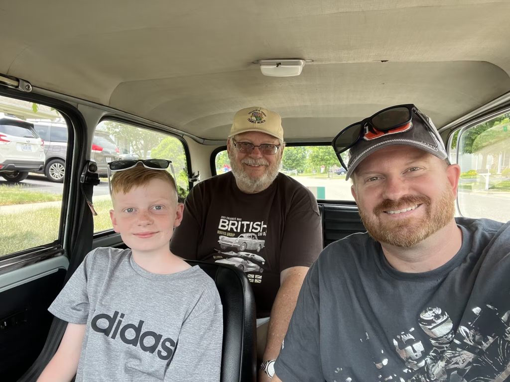 The Fink family in their Mini Cooper