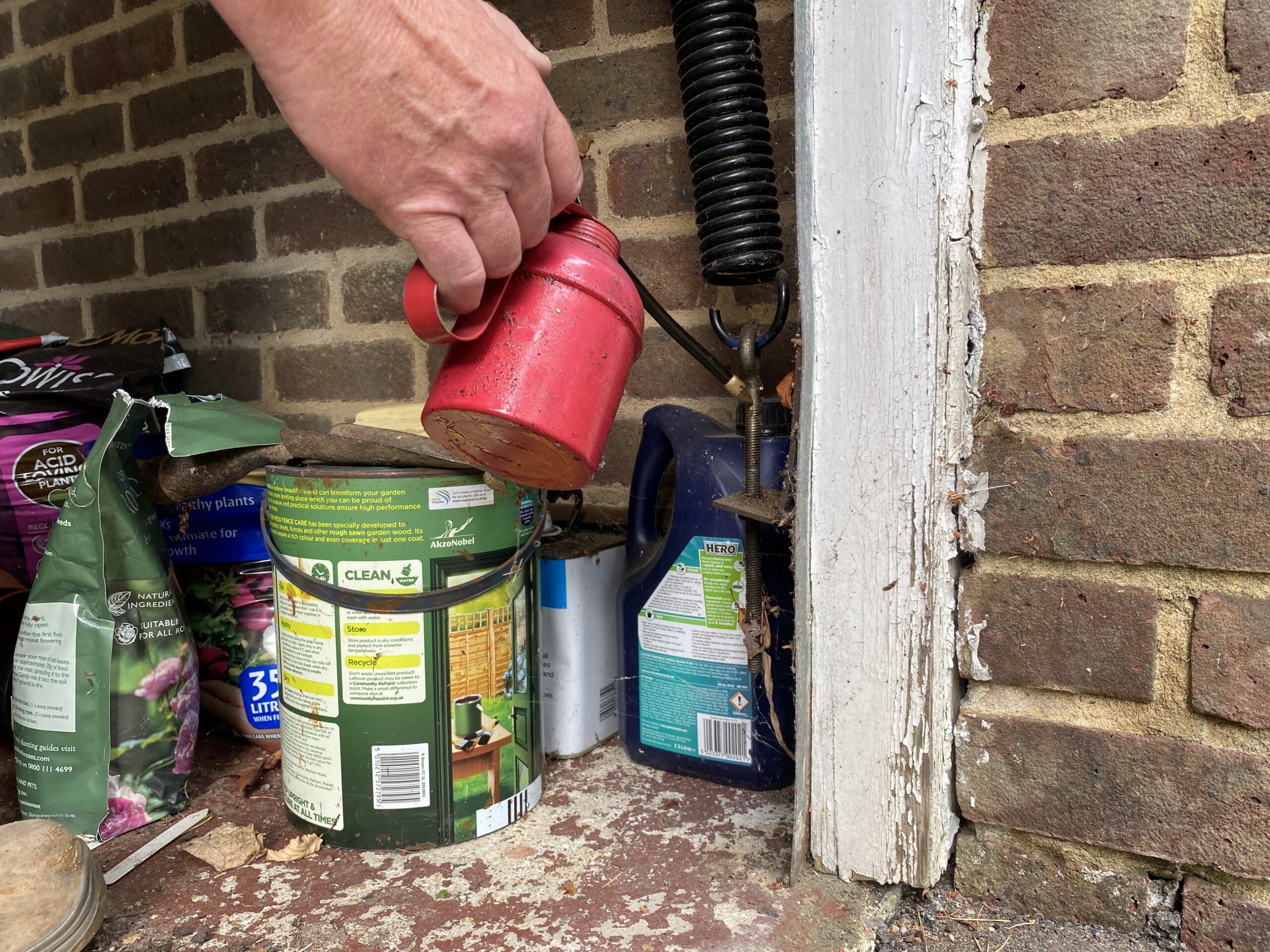 Greasing garage door rails