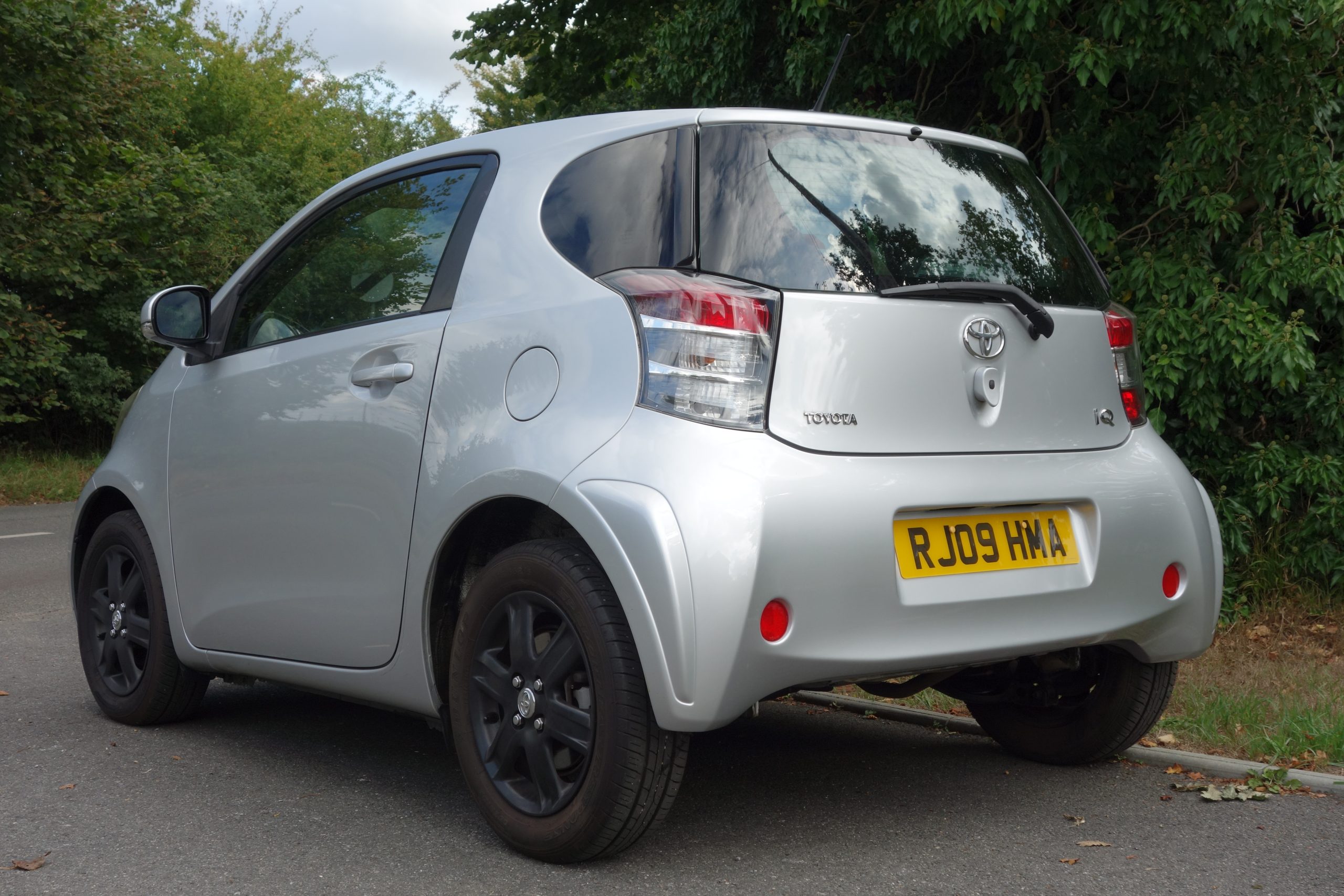 Andrew English and his Toyota iQ