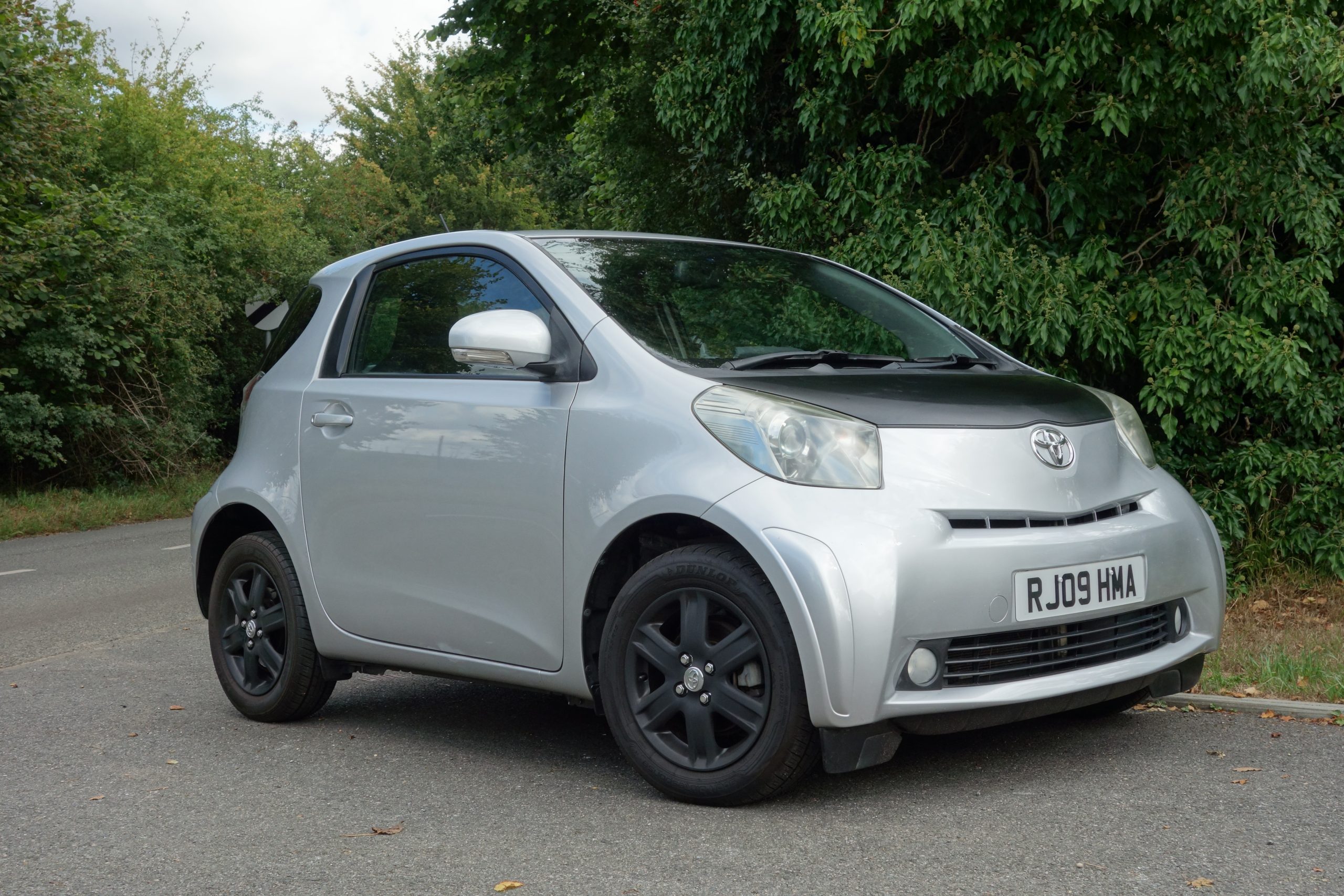 Andrew English and his Toyota iQ