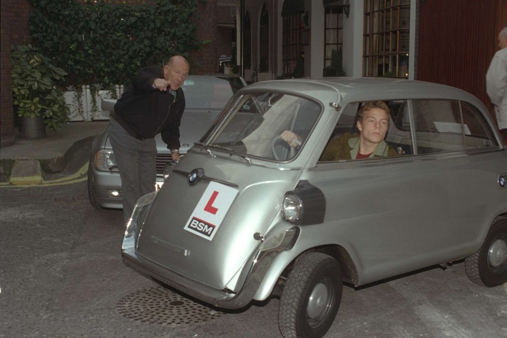 Stirling Moss teaching his son to drive