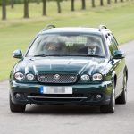 The Queen driving her Jaguar X-Type