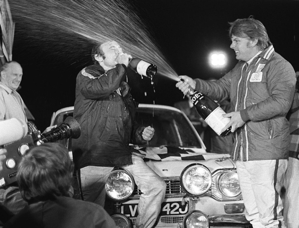 Roger Clark and Tony Mason celebrate winning the 1972 RAC Rally