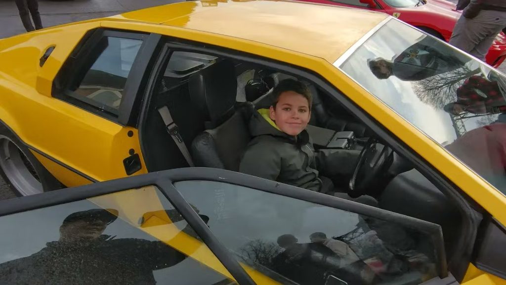 Lotus Esprit with young car fan