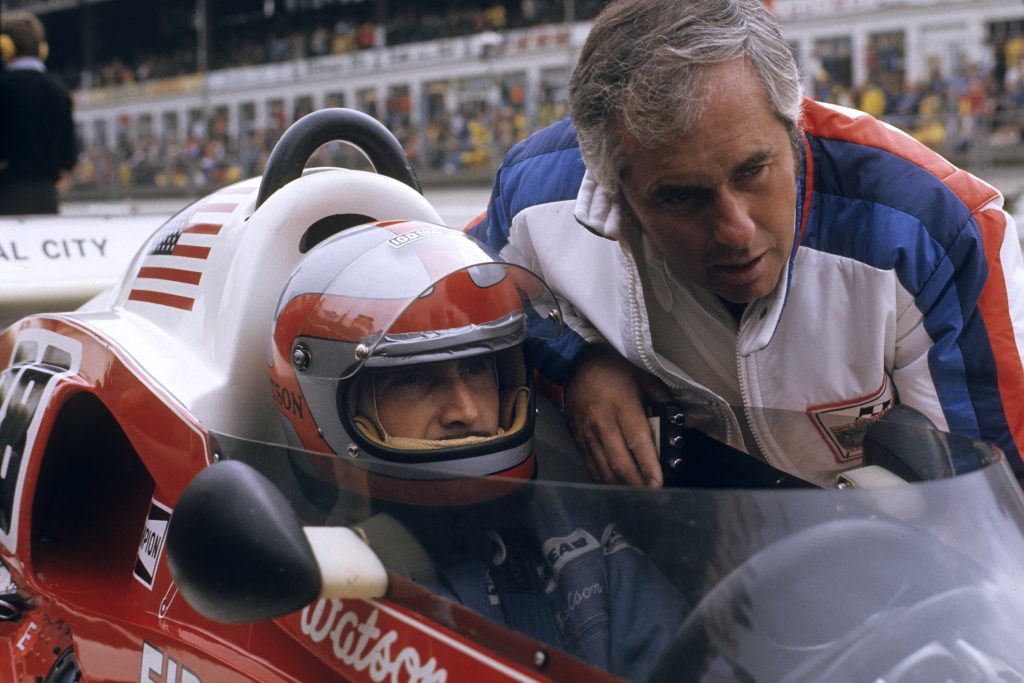 John Watson with team owner Roger Penske at the 1976 German Grand Prix. Paul-Henri Cahier /Getty Images