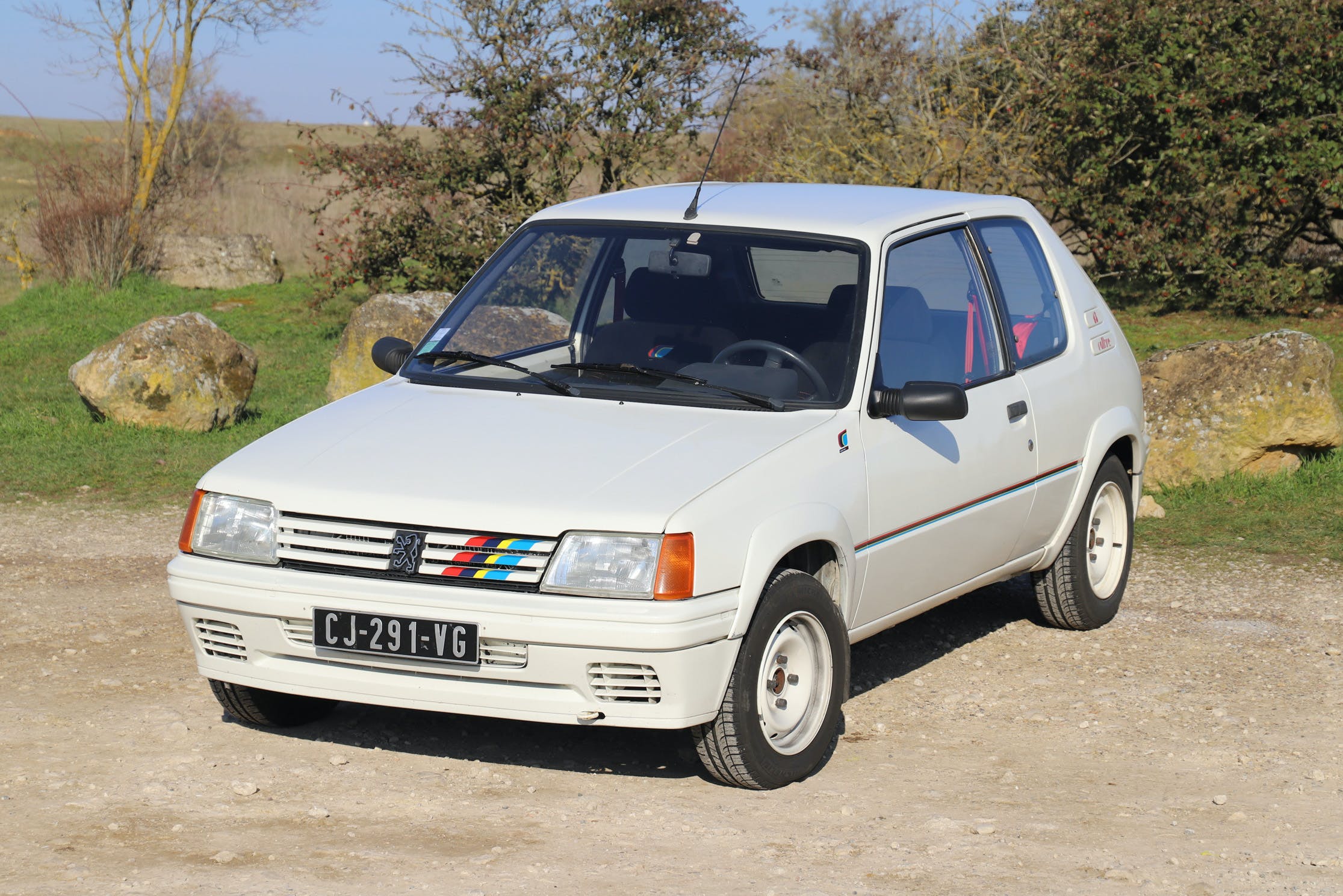 Take the long way home in this Peugeot 205 Rallye