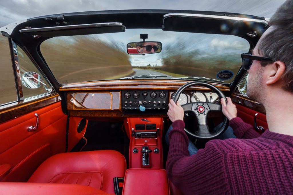 Vicarage Jaguar MkII drophead Noel Gallagher driving