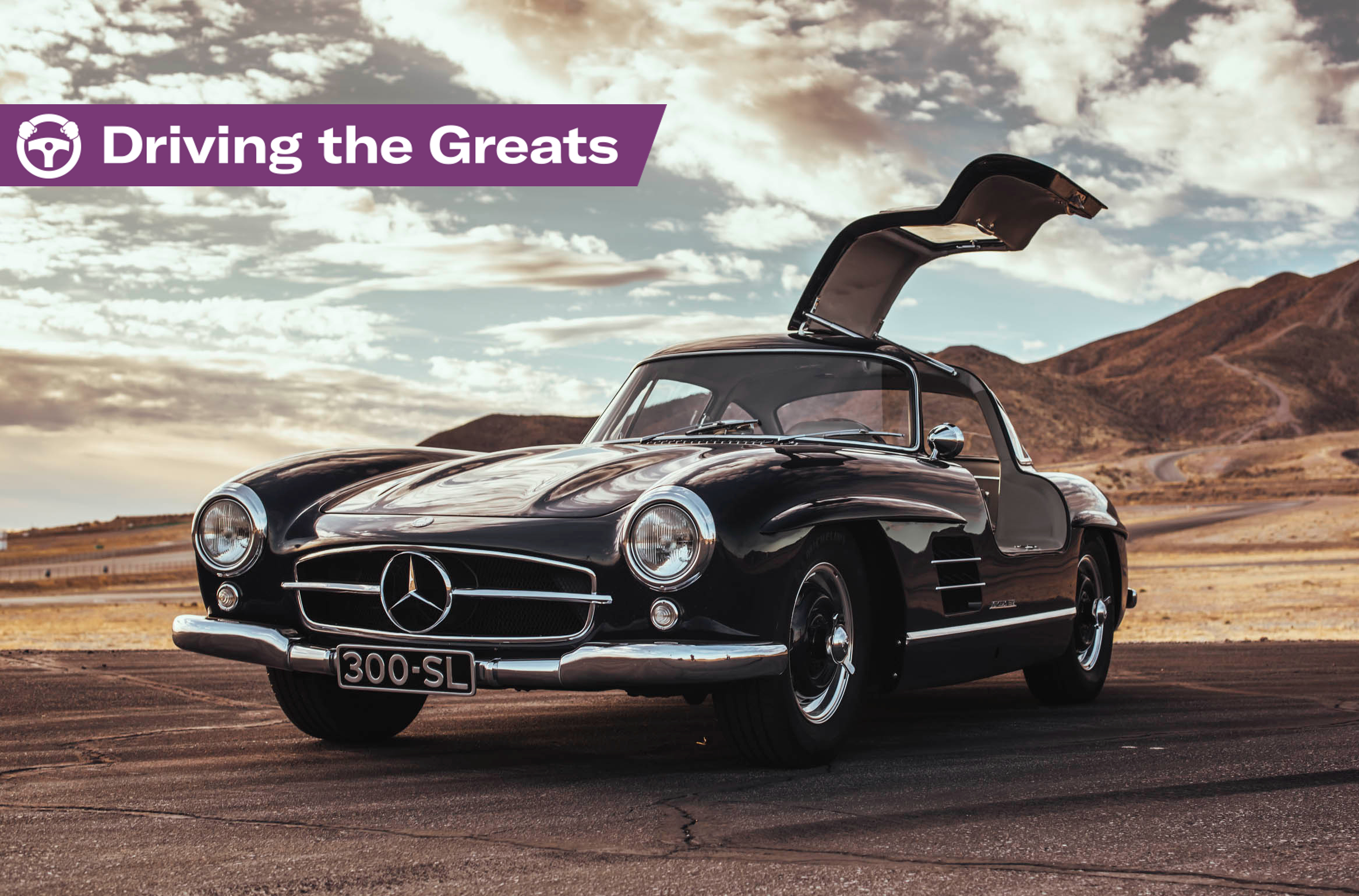 A Silver Grey Mercedesbenz 300sl Gullwing Racing On The Tracks