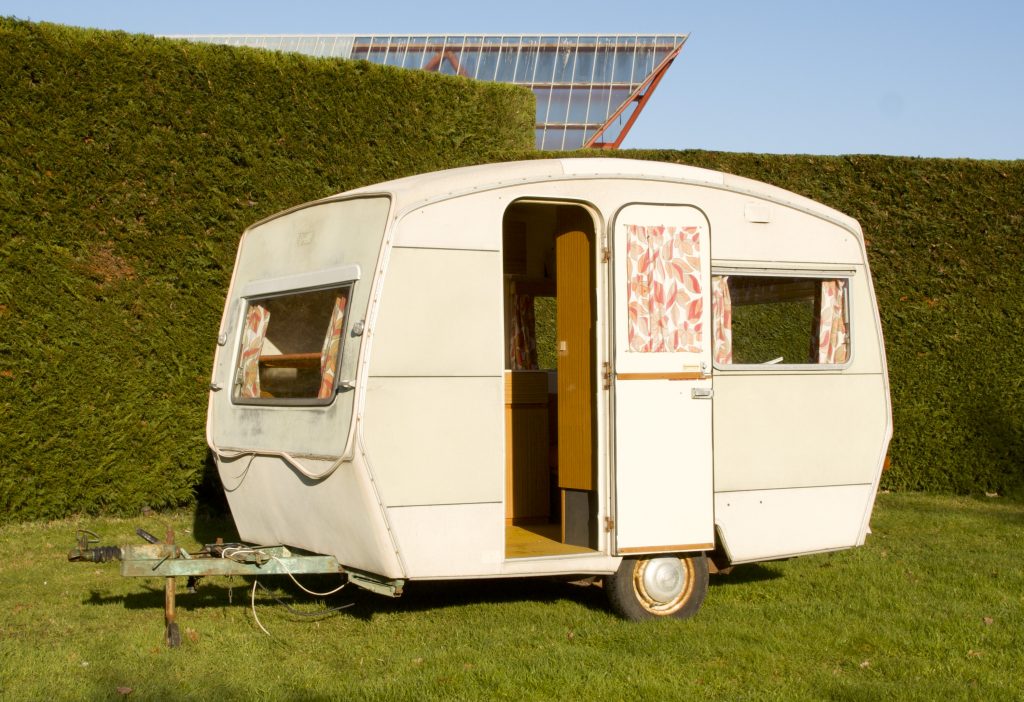 Happy camping in a classic Sprite caravan