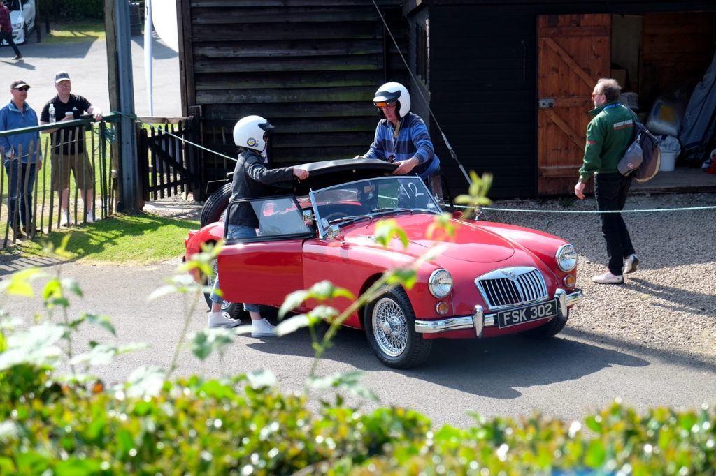 Putting up top on 1960 MGA