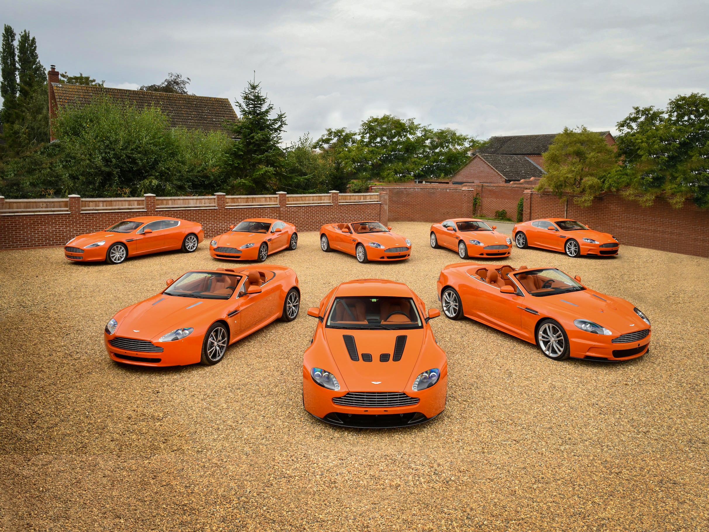 Can’t settle for one orange Aston Martin? Try eight