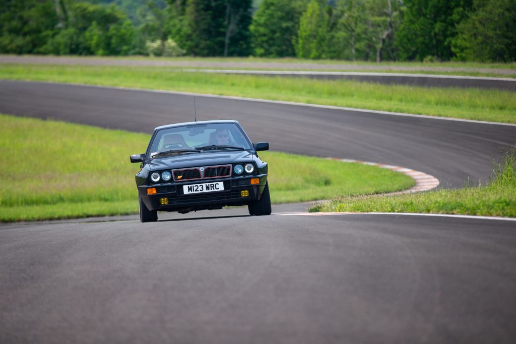 Lancia rally car track action