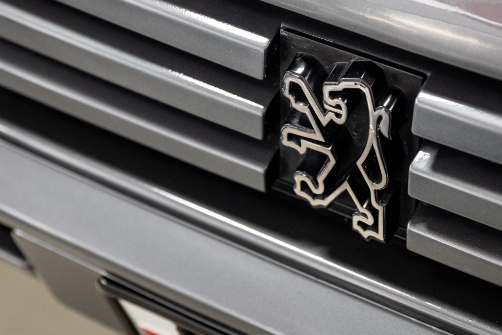 Peugeot rally car emblem