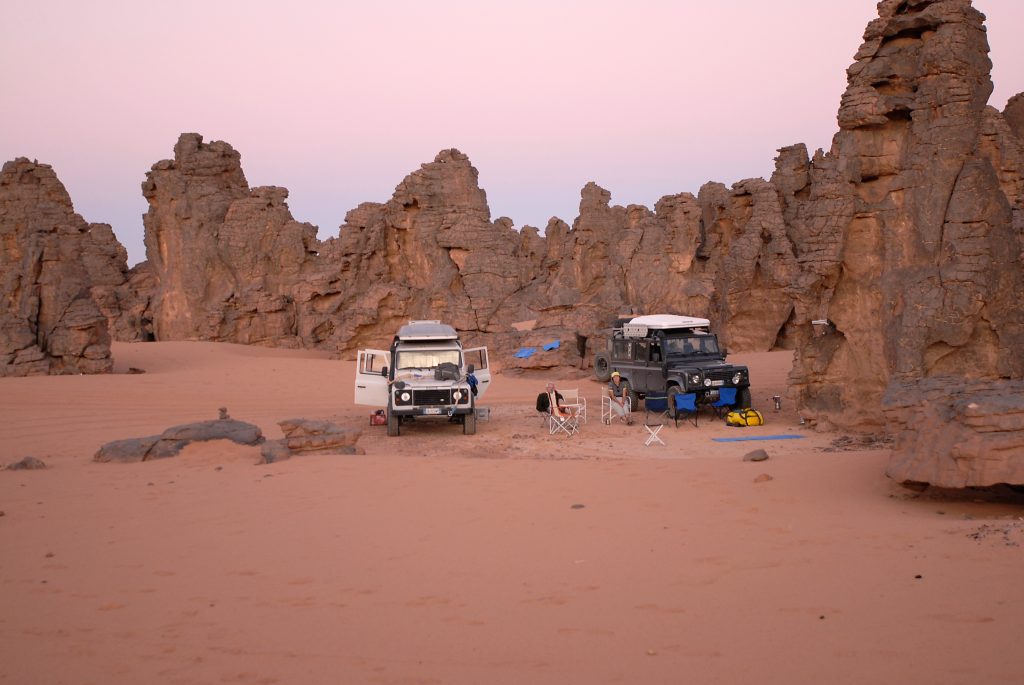 Land Rover Defenders in desert