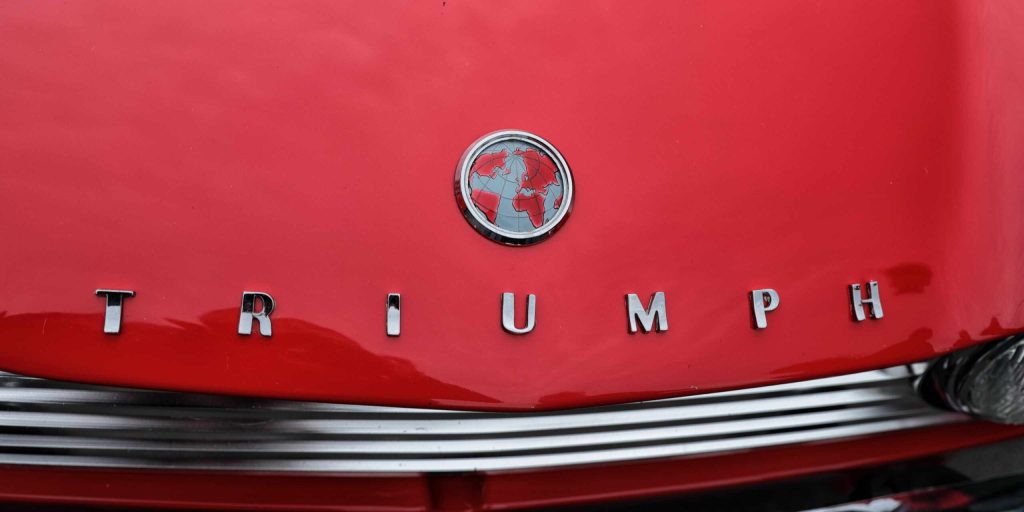 Triumph TR4A globe emblem lettering