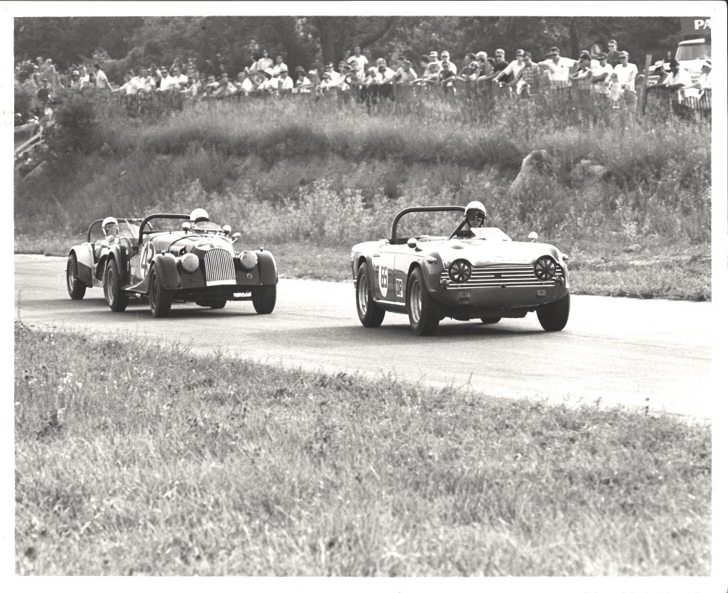 Triumph TR4A racing action waterford hills 1966 black white