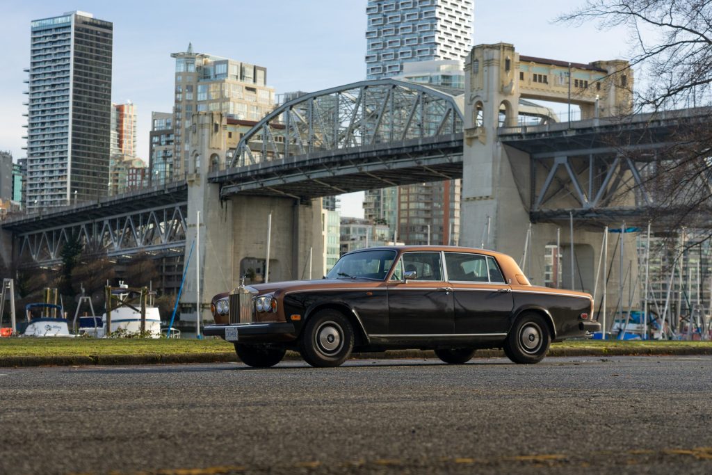 Car Collector Ms Helen Rolls Royce front three quarter urban landscape stance