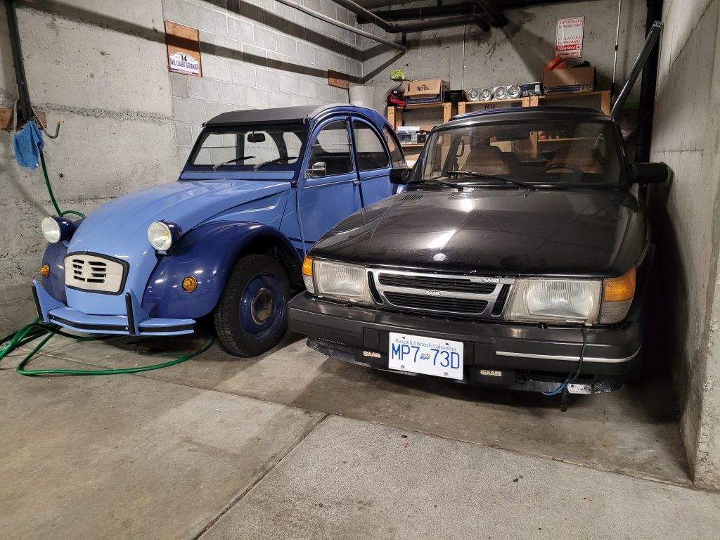 Car Collector Ms Helen Citroen and Saab parked in garage