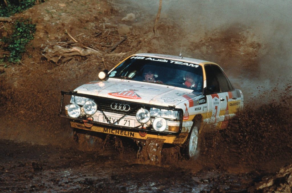 Group B Rally Car Audi racing action mud splash